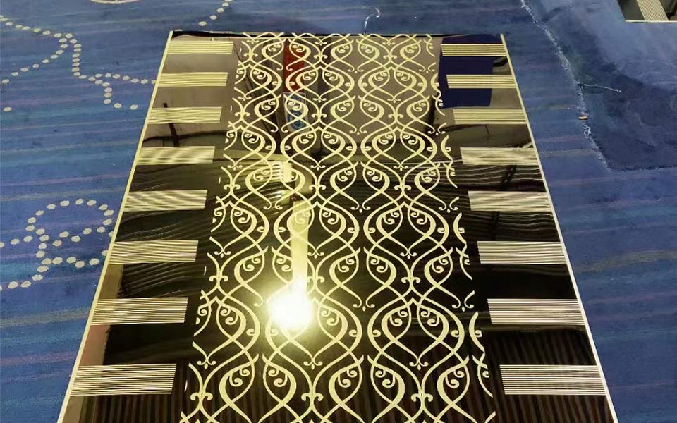 Etched gold mirror sheet for elevator cab before installation